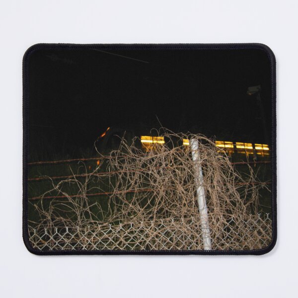 Item preview, SMU train at night with barbed wire fence designed and sold by GetFlicked.
