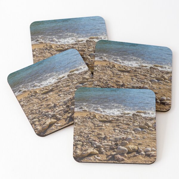 Item preview, Pebble Beach With Rocky Shoreline and Gentle Sea Waves on Sunny Coastal Shore designed and sold by Nmallia.