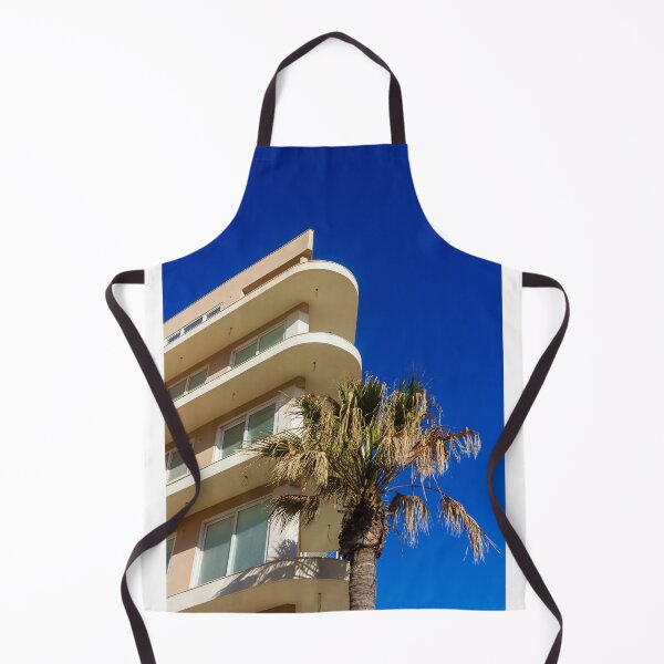 Item preview, Modern Apartment Building With Curved Balconies and Palm Tree Against Deep Blue Sky designed and sold by Nmallia.