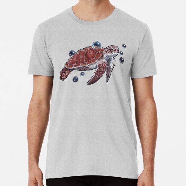 Premium Photo  White t-shirt with a turtle print lies on a white background