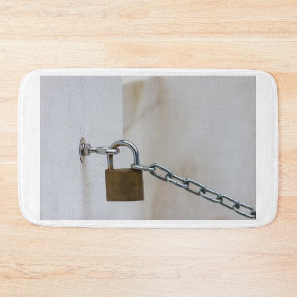 Item preview, Close-Up of a Padlock Securing a Chain to a Wall Hook designed and sold by Nmallia.