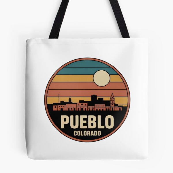 Item preview, Pueblo Colorado: Retro Blue Yellow Orange Sunset Skyline Badge designed and sold by CircinusStore.