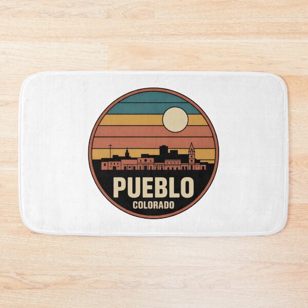 Item preview, Pueblo Colorado: Retro Blue Yellow Orange Sunset Skyline Badge designed and sold by CircinusStore.