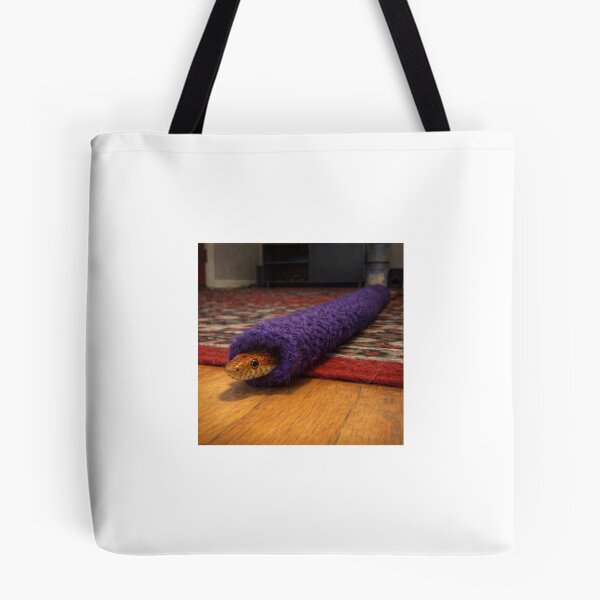 Item preview, Corn snake peeking from purple sleeve designed and sold by donchago.