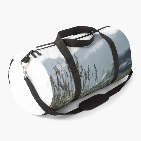 Item preview, Majestic Wolf Peeking Through Grass Mountain View designed and sold by NicolasGlowArt.