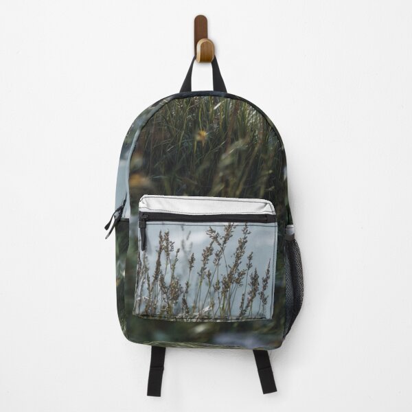 Item preview, Majestic Wolf Peeking Through Grass Mountain View designed and sold by NicolasGlowArt.