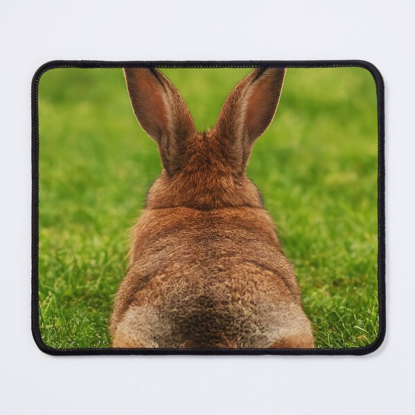 Item preview, Relaxing Bunny – Cute Rabbit from Behind Lying on Grass designed and sold by EmeraldeaArt.