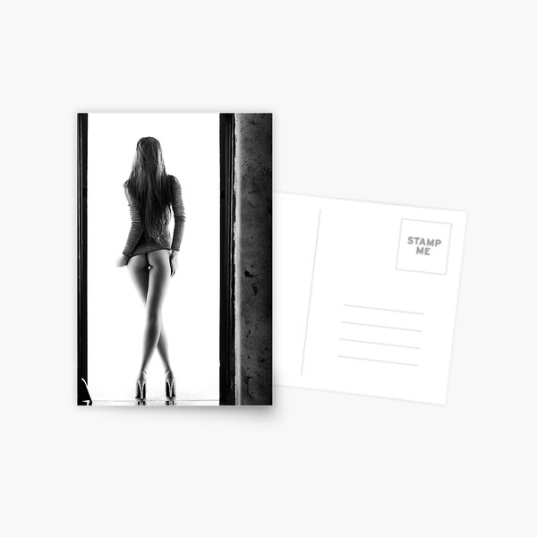 Woman standing in doorway Postcard