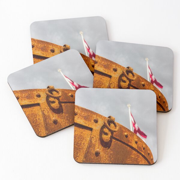 Item preview, Rusty Metal Hull With Heavy Ring Detail and Blurred Flagpole Against Stormy Sky designed and sold by Nmallia.