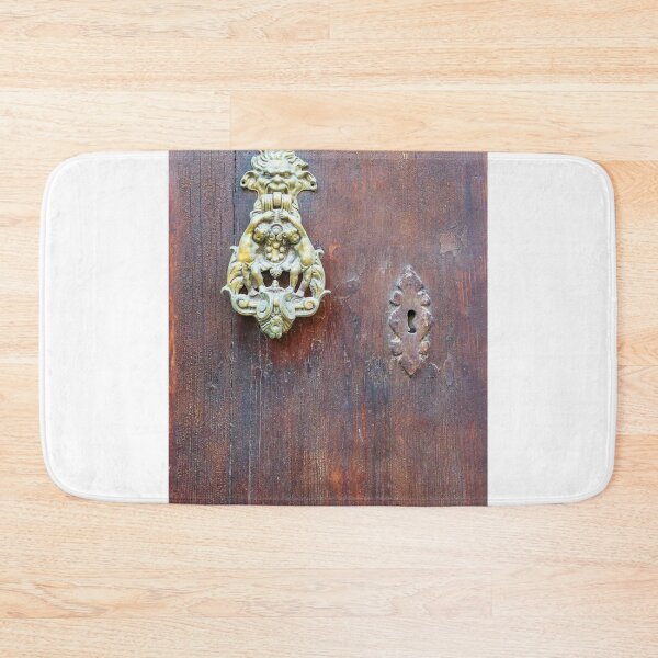 Item preview, Antique Brass Door Knocker And Keyhole On Weathered Wooden Door With Vintage Character designed and sold by Nmallia.
