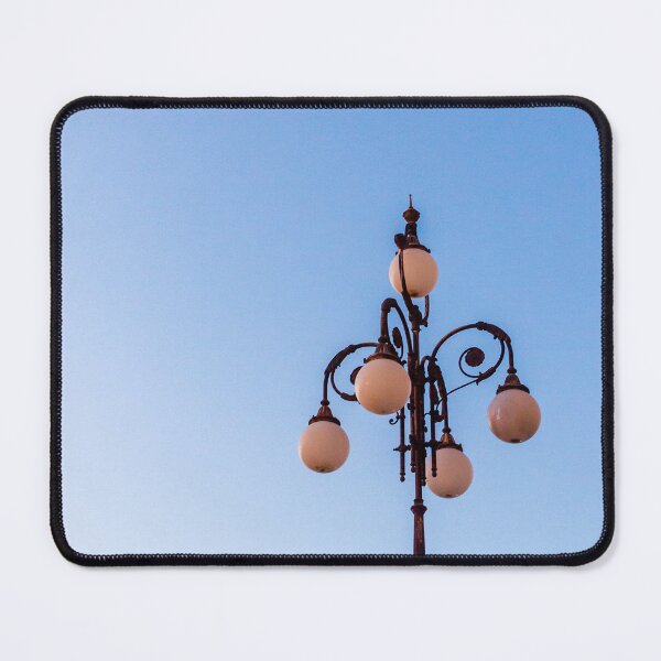 Item preview, Vintage Street Lamp Against Clear Blue Sky With Ornate Globe Lights at Dusk designed and sold by Nmallia.