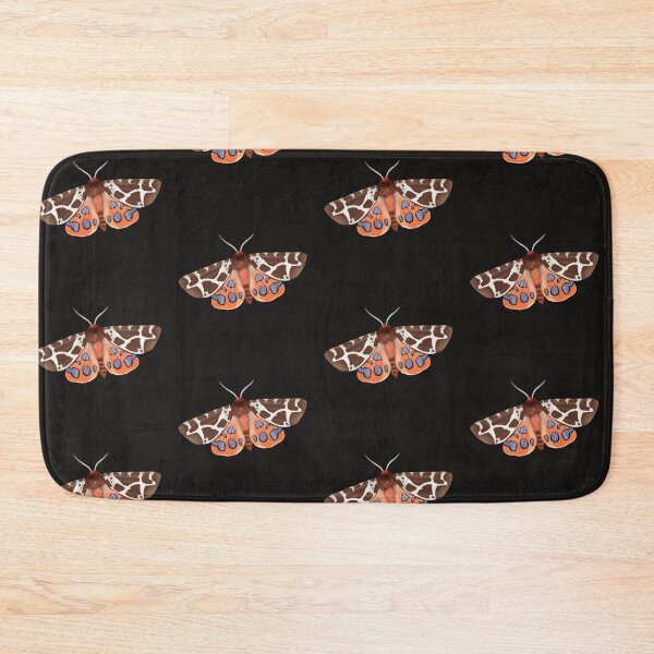 Item preview, Colorful moth with unique markings resting on a surface in a bright setting during daylight hours designed and sold by Ms. Iryna.