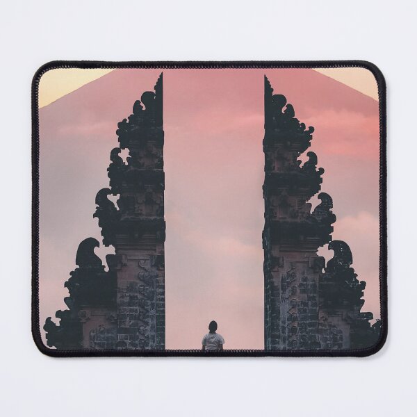 Item preview, Traveler at Bali Temple Split Gate Framed by Mount Agung Volcano at Pink Sunrise Over Clouds designed and sold by GulDesigns.