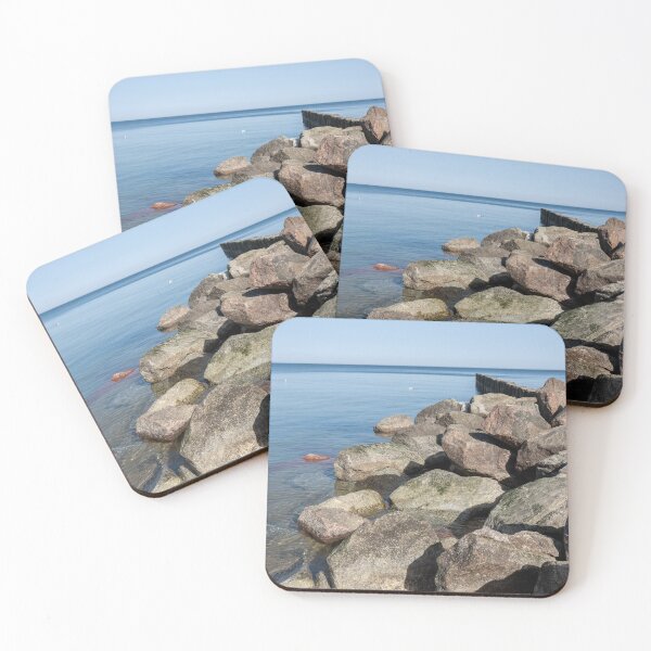 Item preview, Rocky Shoreline with Calm Sea and Wooden Breakwater designed and sold by VisualMoodFoto.
