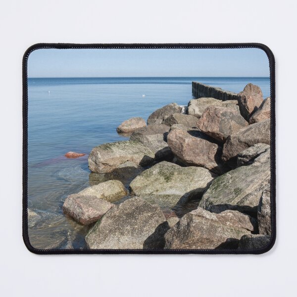 Item preview, Rocky Shoreline with Calm Sea and Wooden Breakwater designed and sold by VisualMoodFoto.