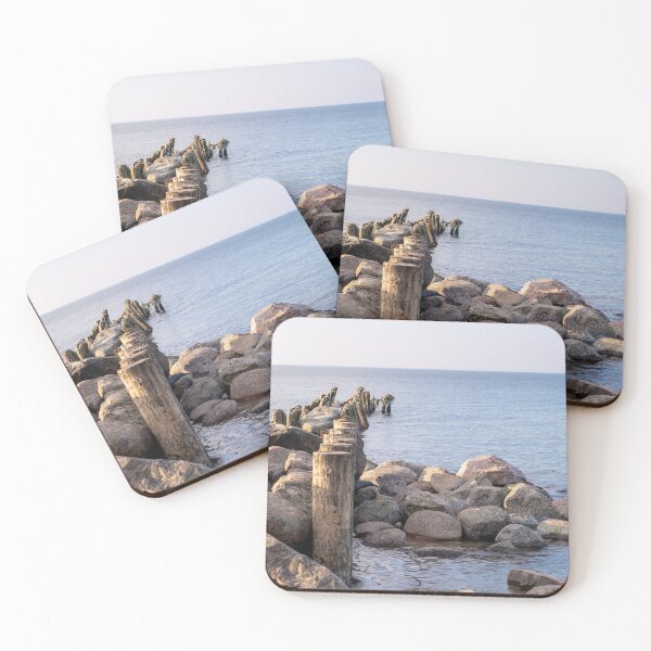 Item preview, Rocky Shoreline with Wooden Breakwater Leading into Calm Sea designed and sold by VisualMoodFoto.