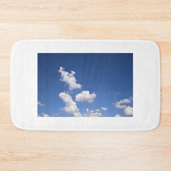 Item preview, Powerline stretching across clouds in blue sky designed and sold by getmybookstore.