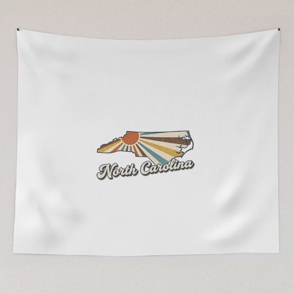 Item preview, North Carolina Retro Sunset State Silhouette – Vintage Distressed Design designed and sold by Paper Drip.