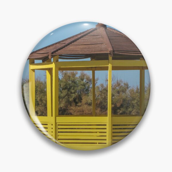 Item preview, Yellow Wooden Gazebo Pavilion On Seafront Promenade With Brown Roof And Blue Sky designed and sold by Nmallia.