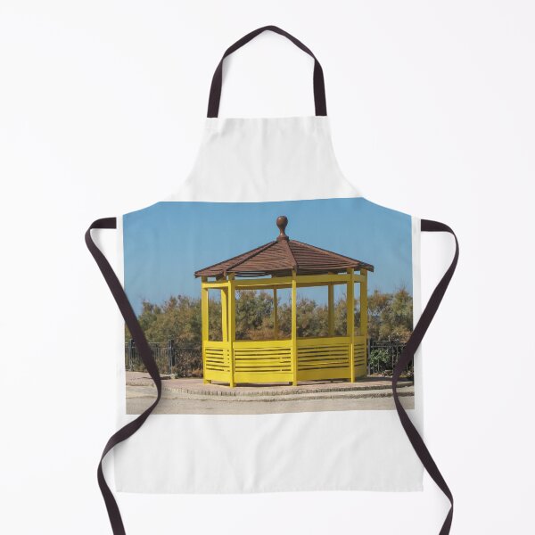 Item preview, Yellow Wooden Gazebo Pavilion On Seafront Promenade With Brown Roof And Blue Sky designed and sold by Nmallia.