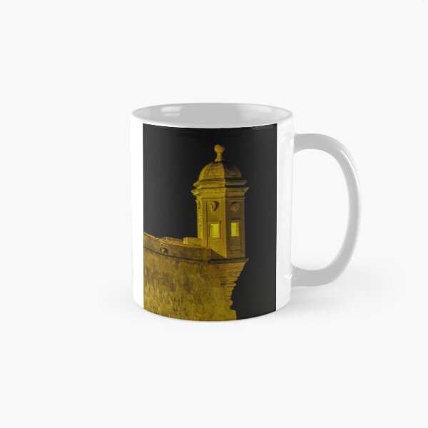 Item preview, Illuminated Stone Fortress Watchtower At Night Over Coastal Wall With Historic Turret And Lamp designed and sold by Nmallia.