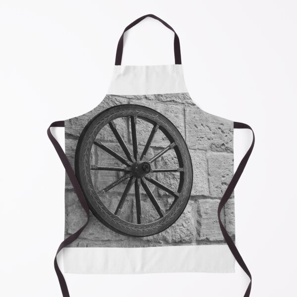 Item preview, Vintage Wagon Wheel Mounted on Rough Stone Wall in Black and White Rustic Decoration designed and sold by Nmallia.