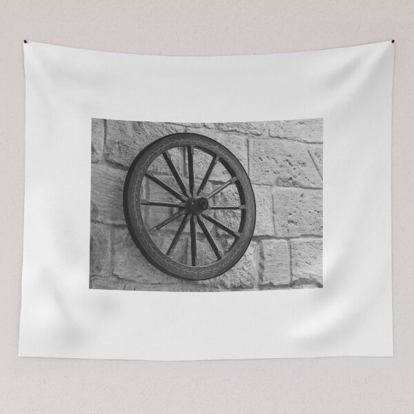 Item preview, Vintage Wagon Wheel Mounted on Rough Stone Wall in Black and White Rustic Decoration designed and sold by Nmallia.