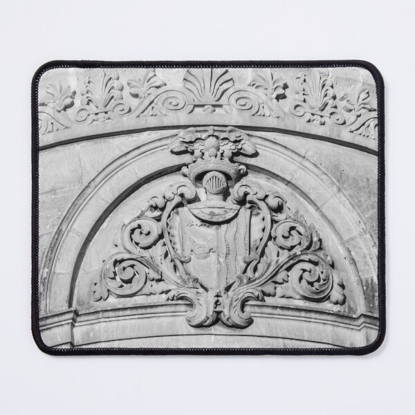 Item preview, Stone Architectural Crest And Ornamental Relief On Historic Building Facade In Black And White designed and sold by Nmallia.