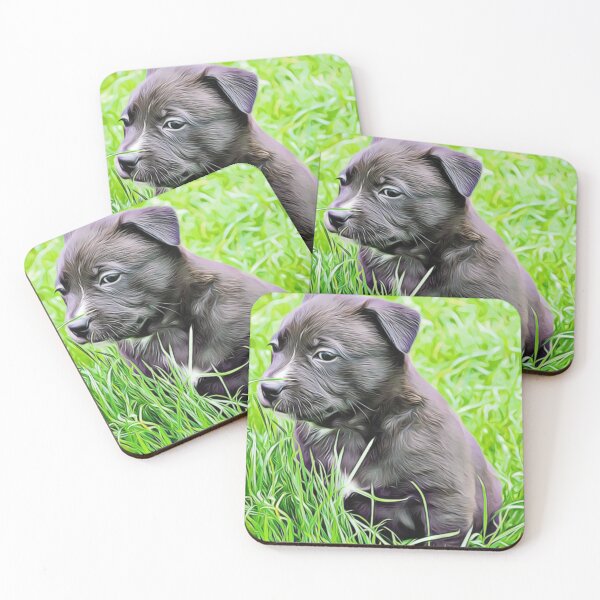 Item preview, A charcoal puppy sitting patiently amidst tall green grass. designed and sold by ZoroDesign.