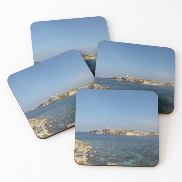 Item preview, Rocky Coastal Island With Statue Over Clear Blue Mediterranean Sea On Sunny Day designed and sold by Nmallia.