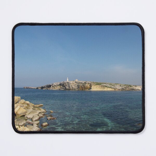 Item preview, Rocky Coastal Island With Statue Over Clear Blue Mediterranean Sea On Sunny Day designed and sold by Nmallia.