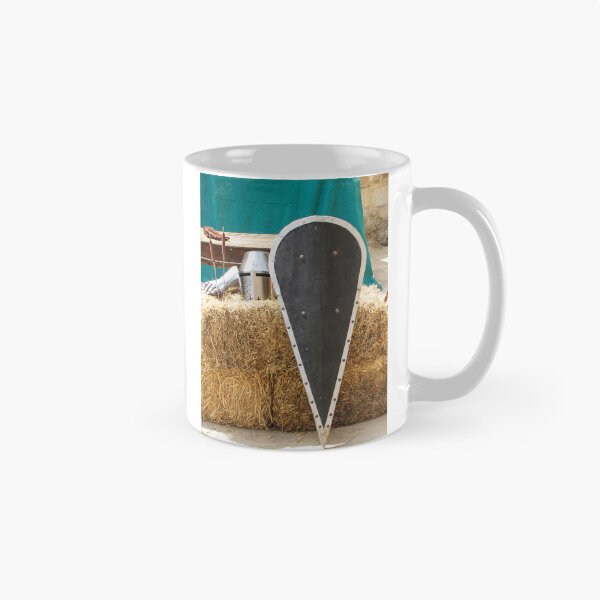 Item preview, Medieval Kite Shield and Helmet Resting on Straw Bales With Gauntlet and Weapons designed and sold by Nmallia.