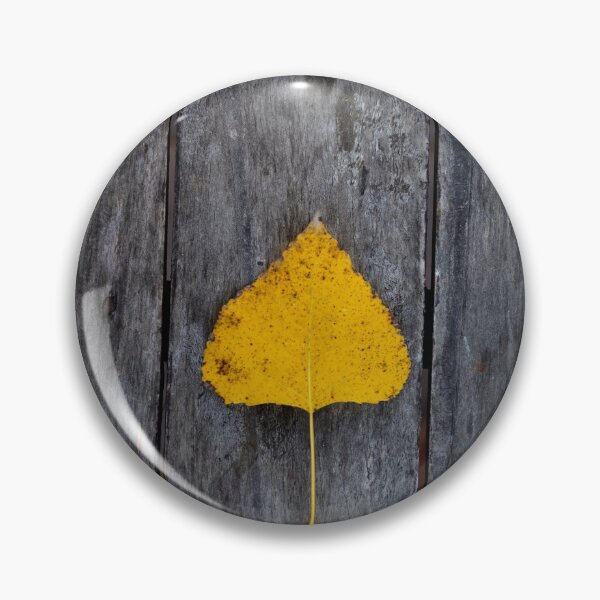 Item preview, Single Yellow Leaf on Rustic Wood – Minimal Autumn Composition designed and sold by onubi.