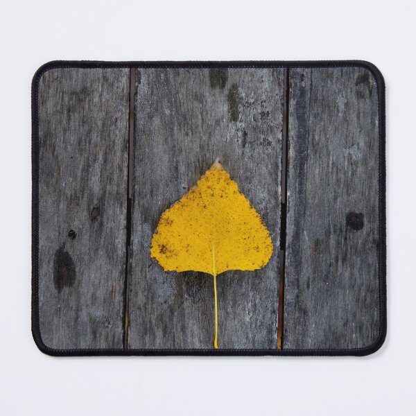 Item preview, Single Yellow Leaf on Rustic Wood – Minimal Autumn Composition designed and sold by onubi.
