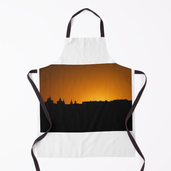 Item preview, City Skyline Silhouette At Orange Sunset With Historic Rooftops And Church Spires Against Sky designed and sold by Nmallia.