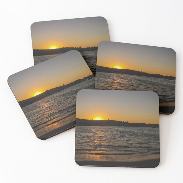 Item preview, Sunset Over Harbor Beach With Silhouette Child Sitting on Shore and City Skyline Beyond designed and sold by Nmallia.