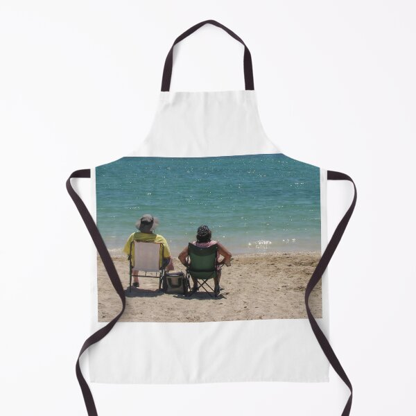 Item preview, Couple Sitting in Beach Chairs Facing Turquoise Ocean Waves Relaxing on Sunny Sandy Shore designed and sold by Nmallia.