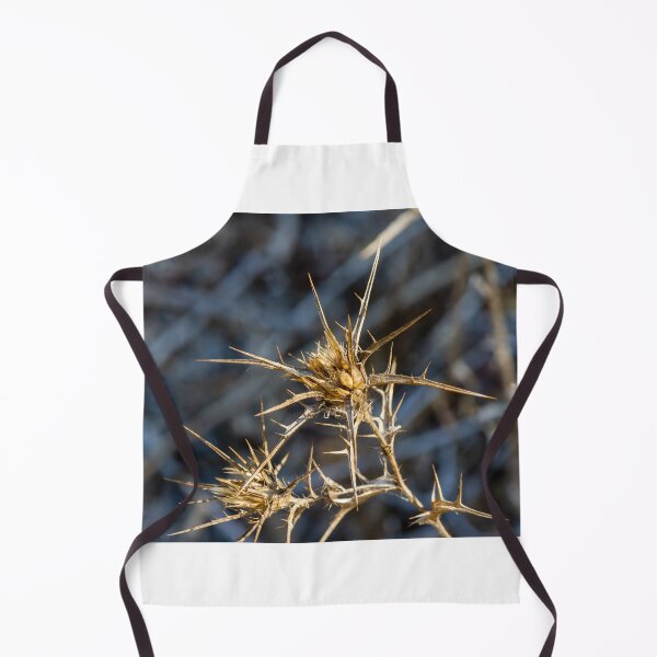 Item preview, Dry Spiky Thistle Plant Close-Up With Sharp Seedheads And Blurred Natural Background designed and sold by Nmallia.