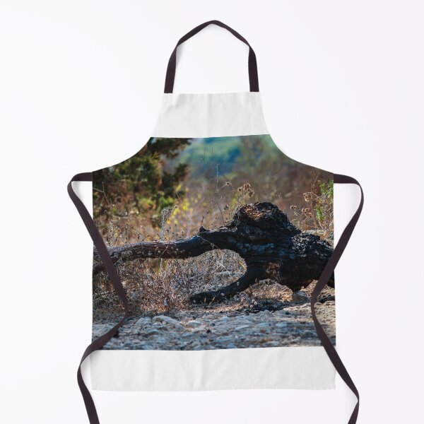 Item preview, Charred Fallen Tree Trunk in Dry Brush on Rocky Hillside After Wildfire designed and sold by Nmallia.