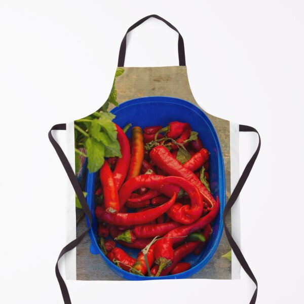 Item preview, Red Chili Peppers in Blue Container With Fresh Herbs on Wooden Table designed and sold by Nmallia.