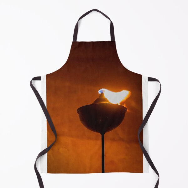 Item preview, Traditional Oil Lamp Flame Casting Warm Amber Light Against Dark Background for Ceremony designed and sold by Nmallia.
