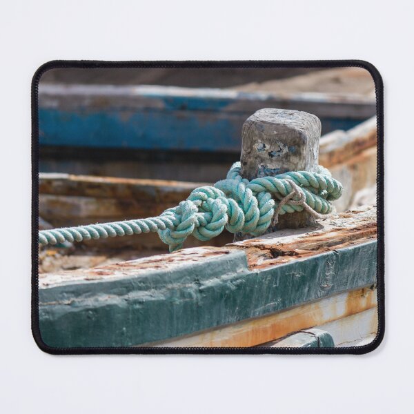 Item preview, Weathered Rope Tied to Cleat on Old Rustic Boat With Peeling Paint and Rust designed and sold by Nmallia.