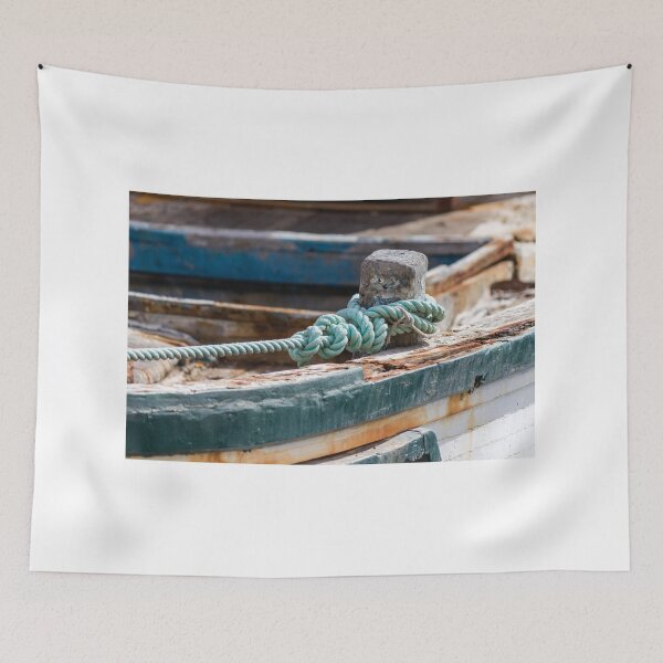 Item preview, Weathered Rope Tied to Cleat on Old Rustic Boat With Peeling Paint and Rust designed and sold by Nmallia.