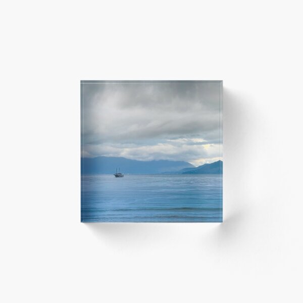 Item preview, Lonely Sailboat in Blue Mist Mountains Ocean designed and sold by agathamourao.