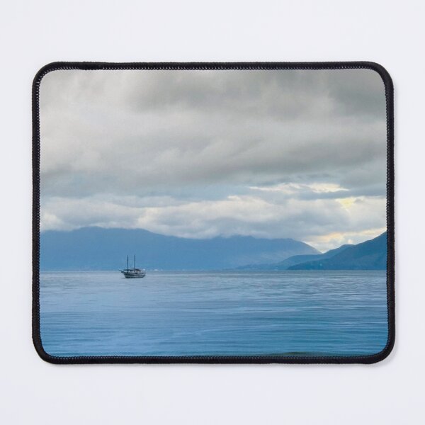 Item preview, Lonely Sailboat in Blue Mist Mountains Ocean designed and sold by agathamourao.