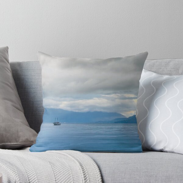 Item preview, Lonely Sailboat in Blue Mist Mountains Ocean designed and sold by agathamourao.