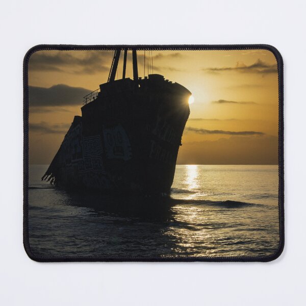 Item preview, Sunrise Silhouette of Abandoned Ship in Greece designed and sold by PhotoArt by Joan Carroll.