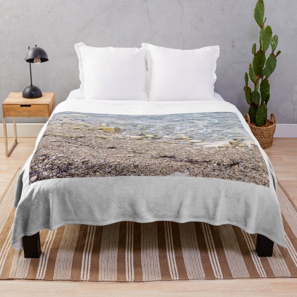 Item preview, Pebble Beach Shoreline With Gentle Waves, Rocks And Seaweed On A Calm Coastal Seashore designed and sold by Nmallia.