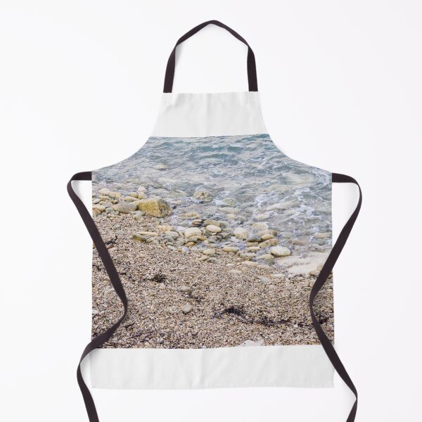 Item preview, Pebble Beach Shoreline With Gentle Waves, Rocks And Seaweed On A Calm Coastal Seashore designed and sold by Nmallia.