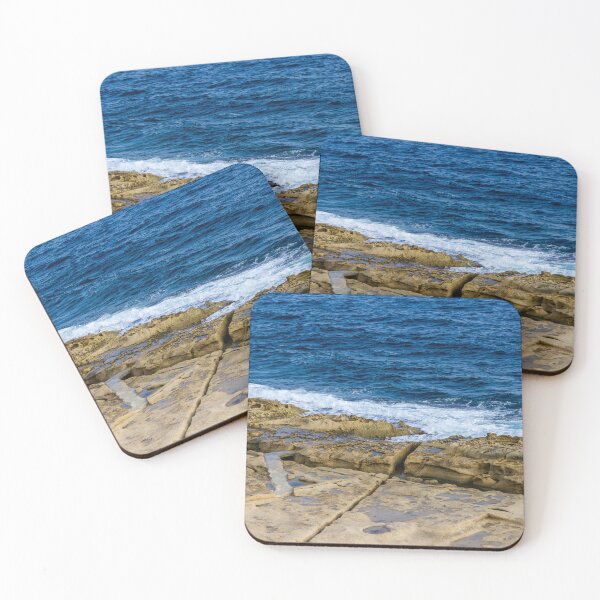 Item preview, Rugged Rocky Coastline with Blue Ocean Waves Crashing on Sandstone Shore designed and sold by Nmallia.